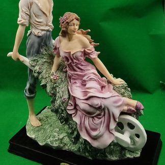 Figura dama en carreta.
